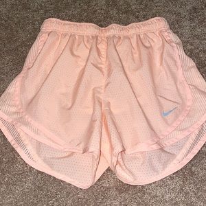 Light coral Nike athletic shorts